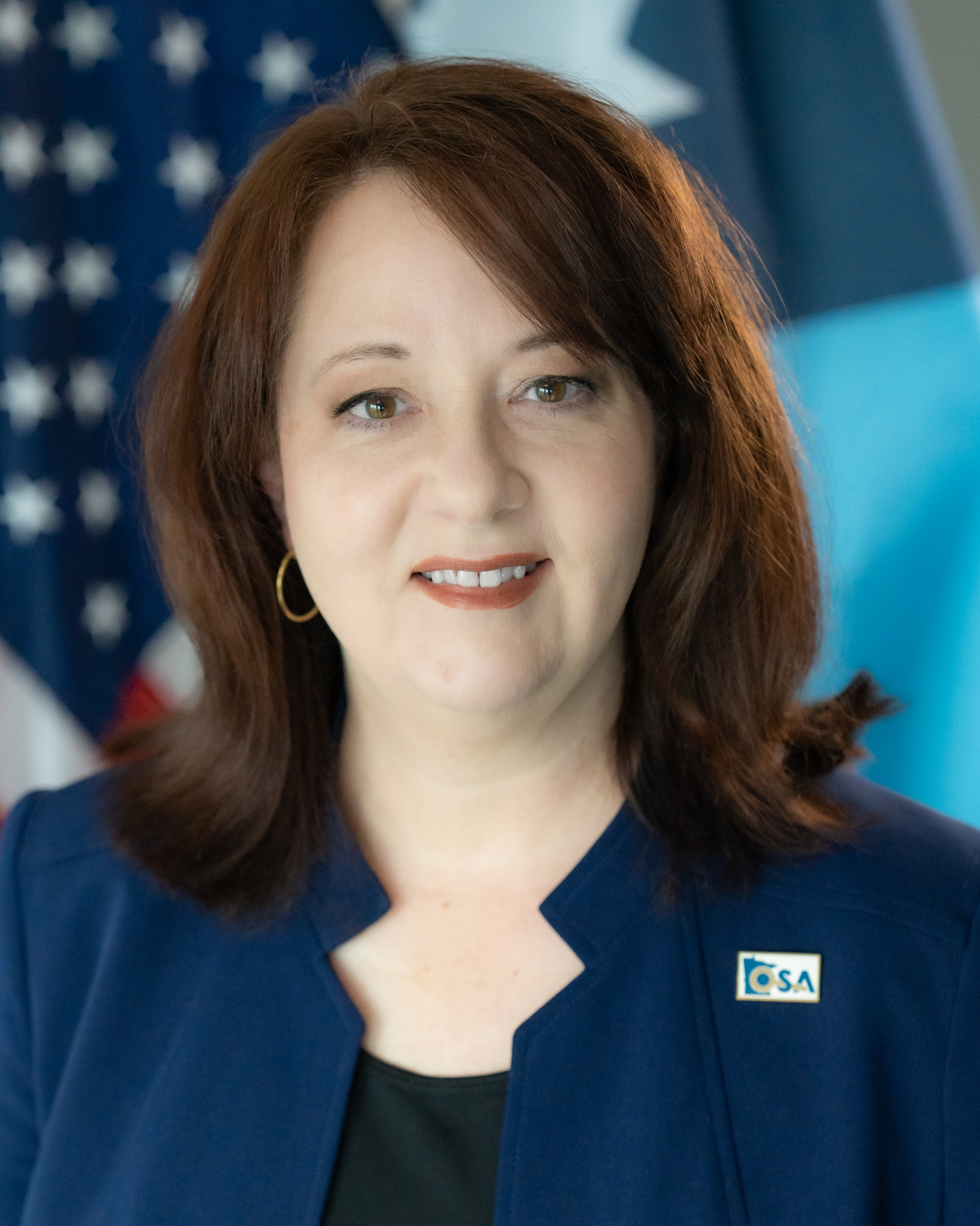The Honorable Julie Blaha, State Auditor, Ex-officio member