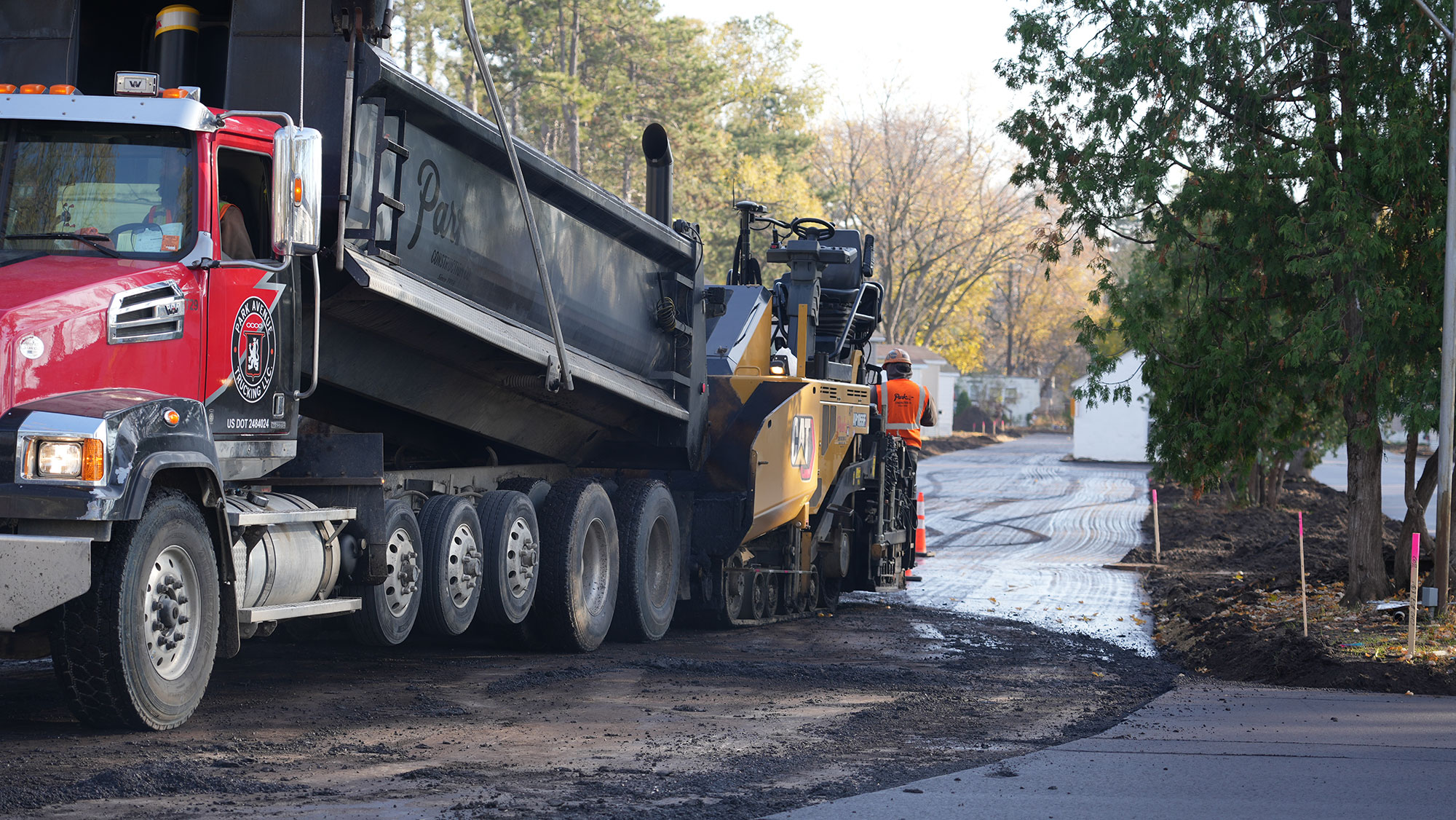 Road crew paving a new road
